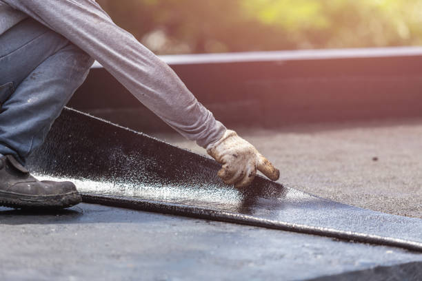 Professional Waterproofing technician working in Genesee, MI